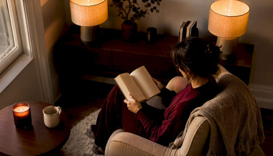 Warmly lit living room with side-table lamps