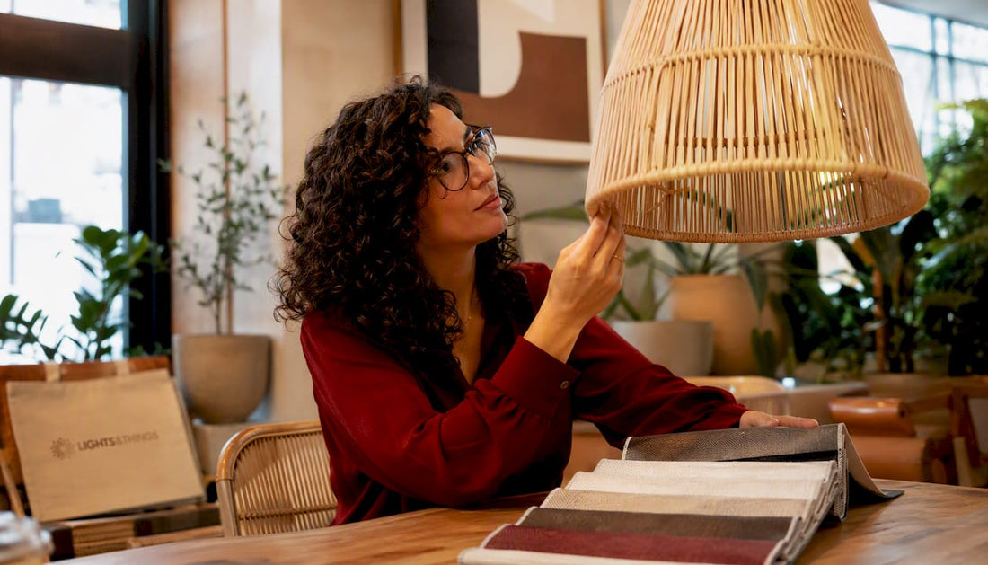 Interior designer studying rattan pendant light