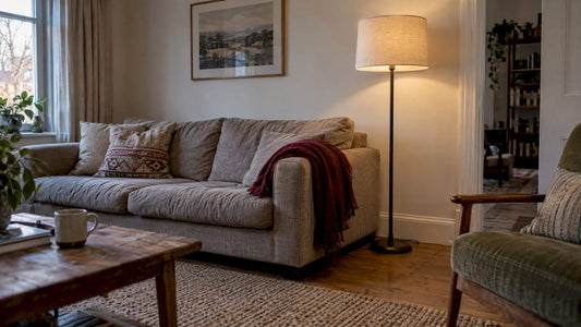Floor lamp positioned beside sofa