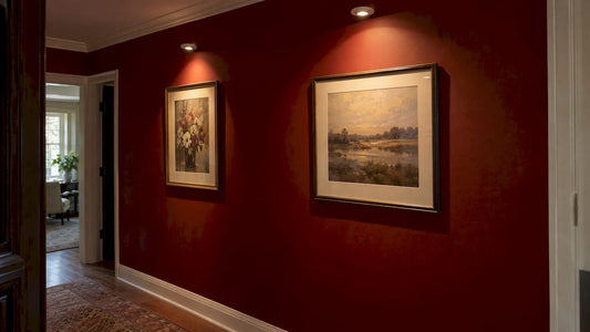 Two spotlights create different spreads on artwork