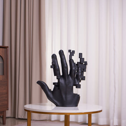 Matte black resin sculpture of pixelated hand